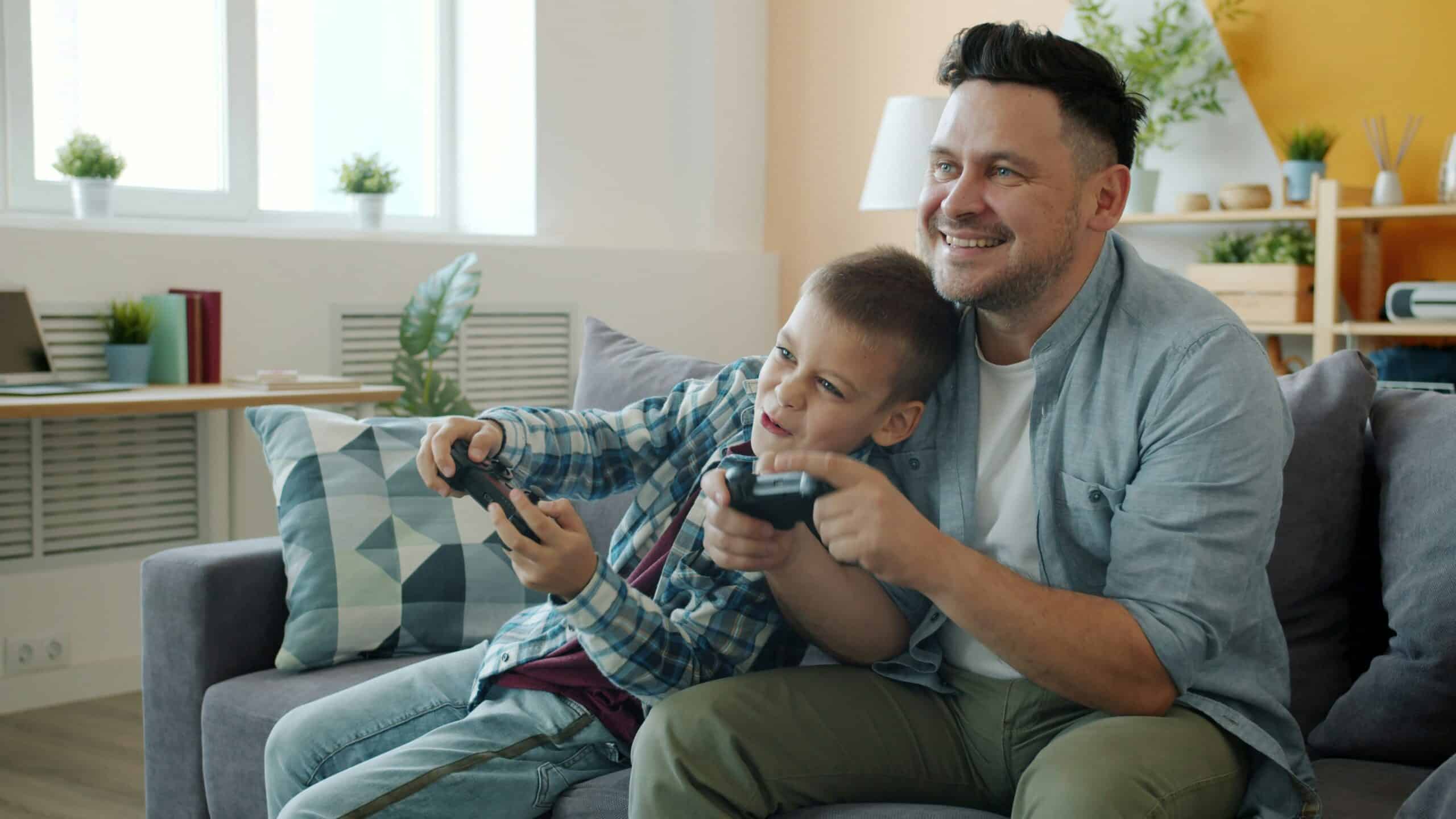 Father and son spending quality time in their home secure in the community management solutions