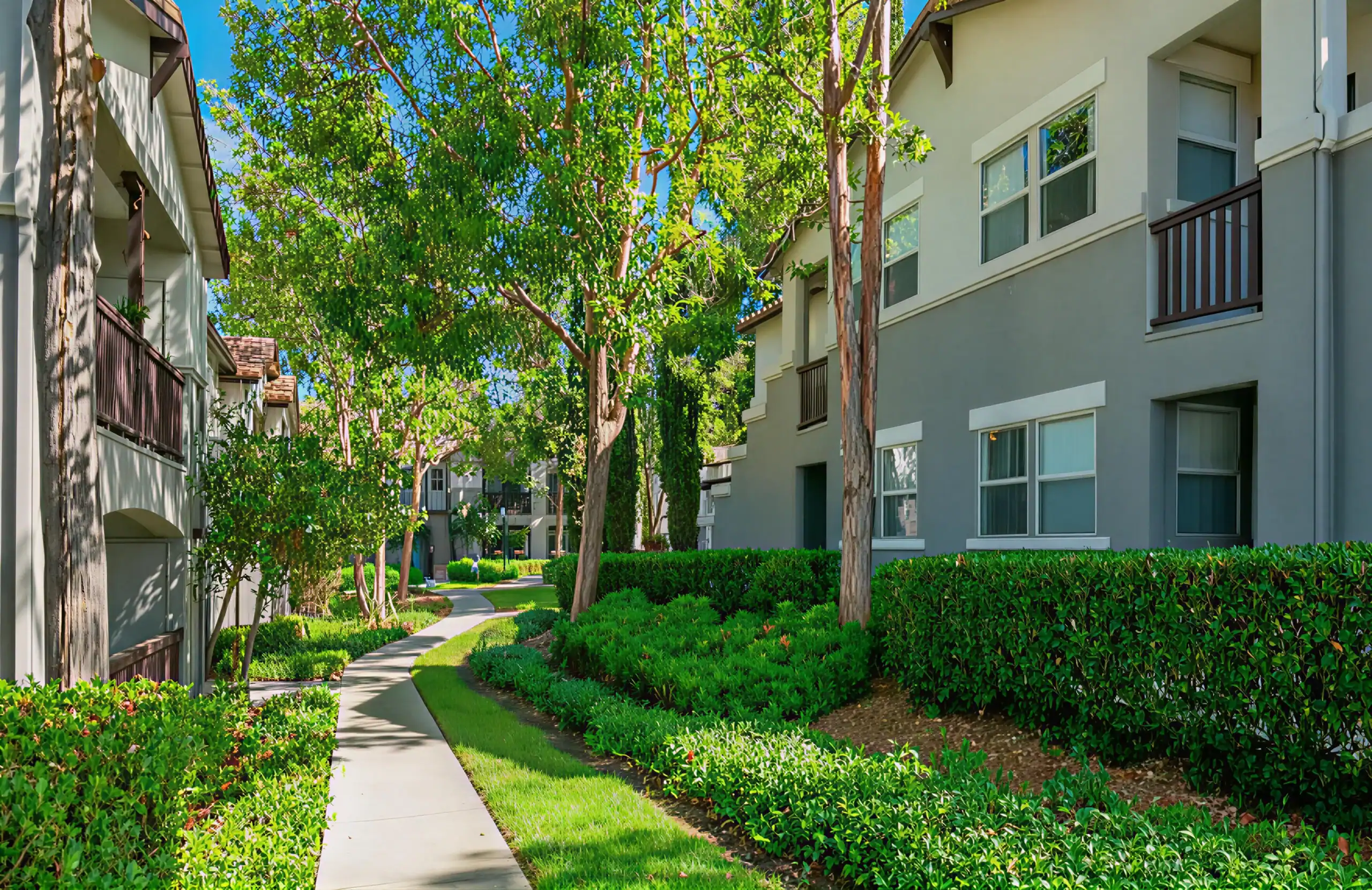 Family happily spending time together in their home under Orange County Community management